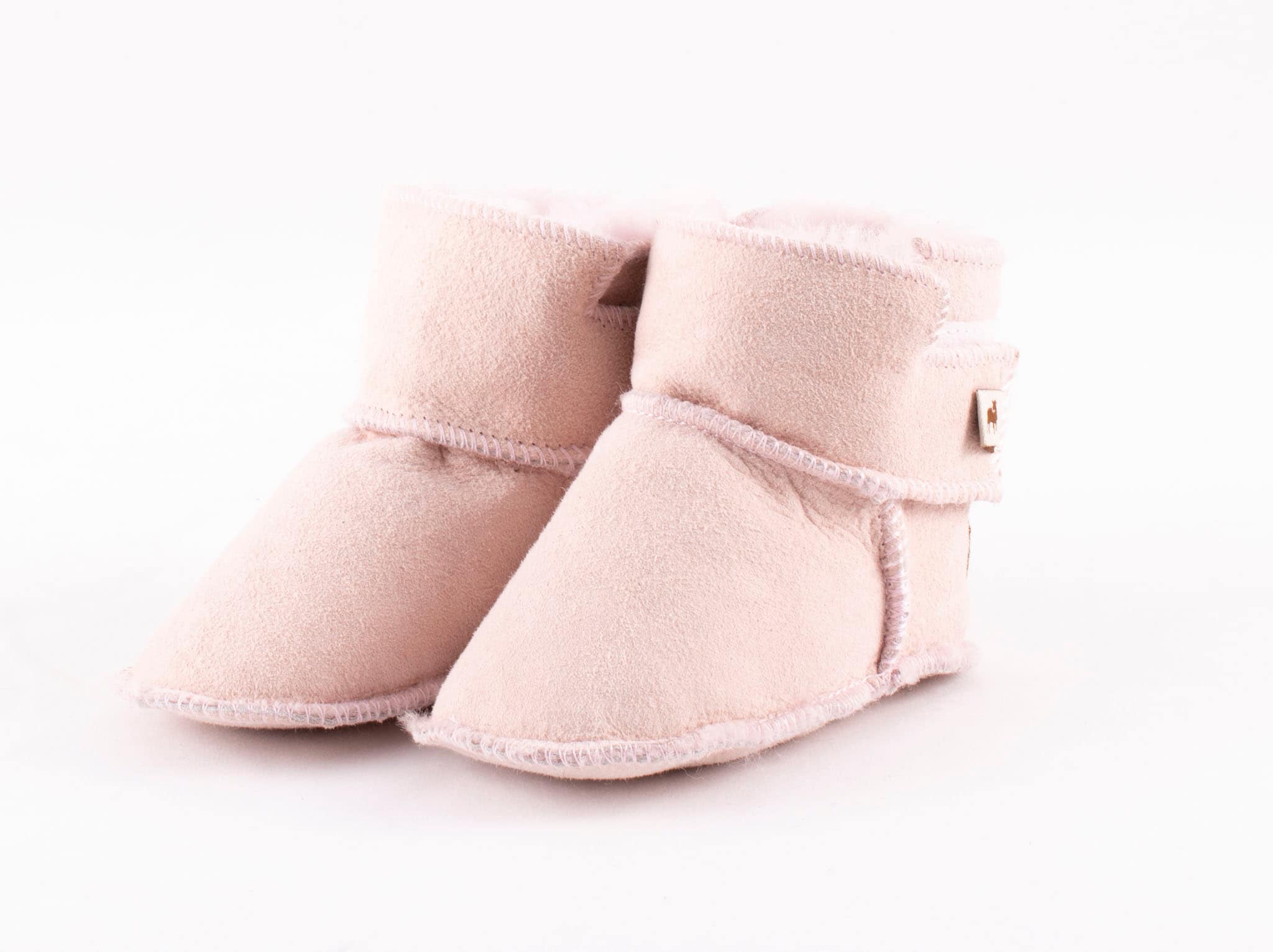 pink baby slippers