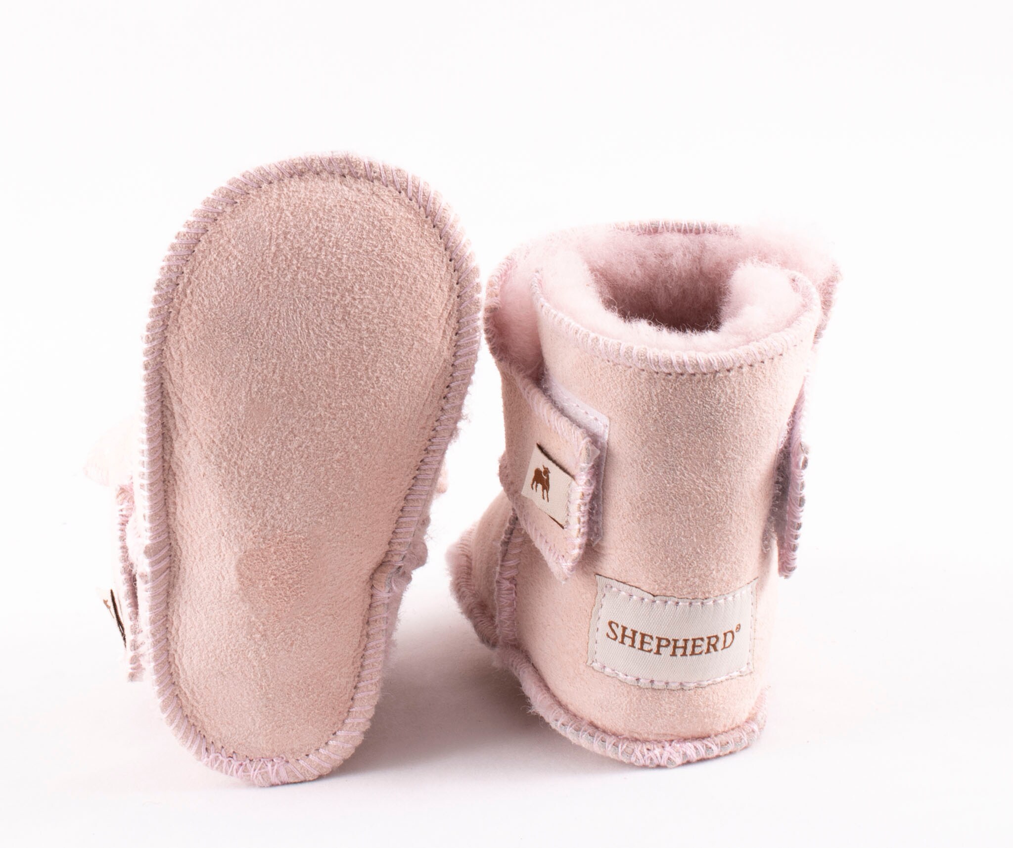 pink baby slippers