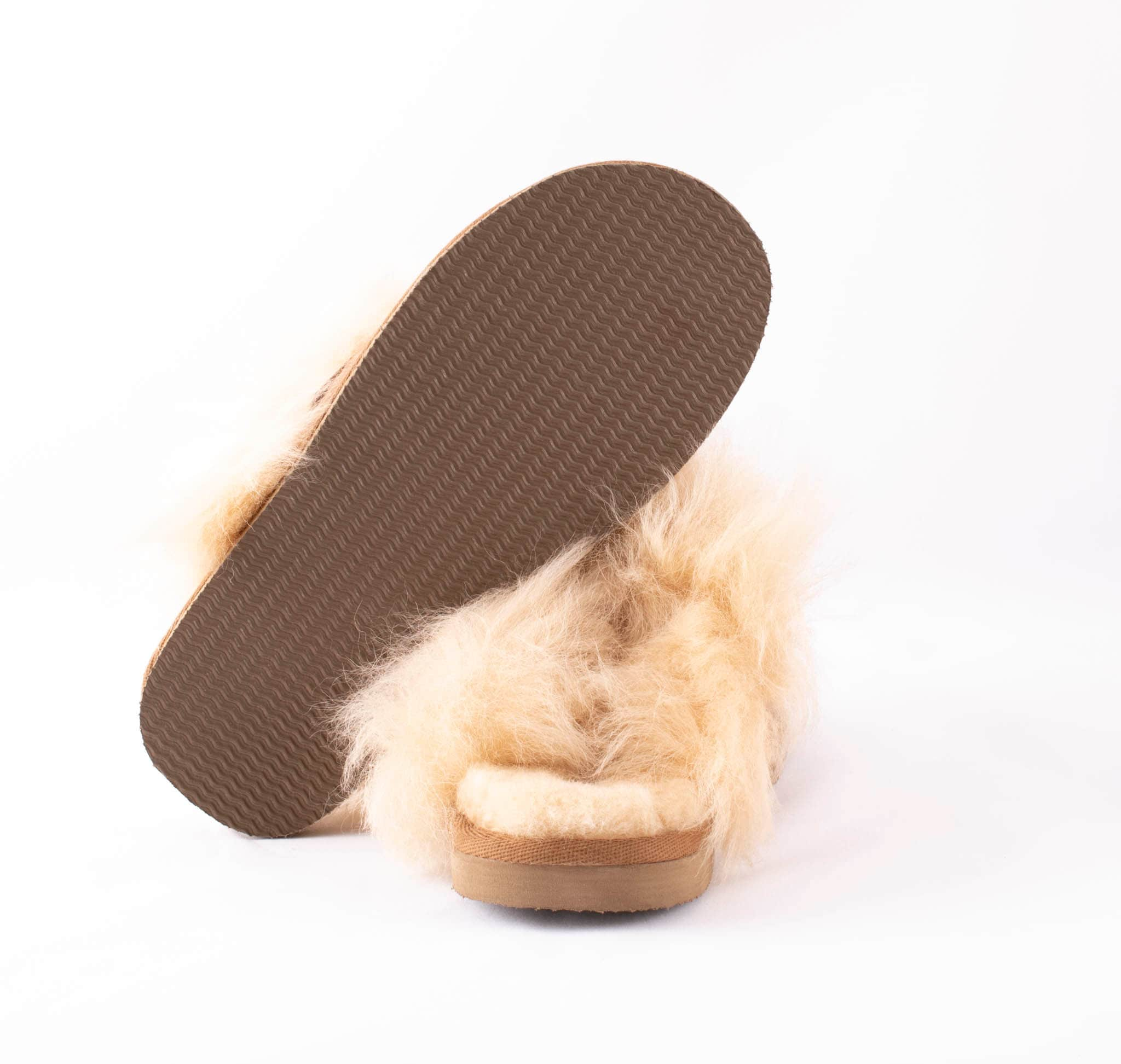 Shepherd Evelina. Is a pair of slip-in slippers in sheepskin.