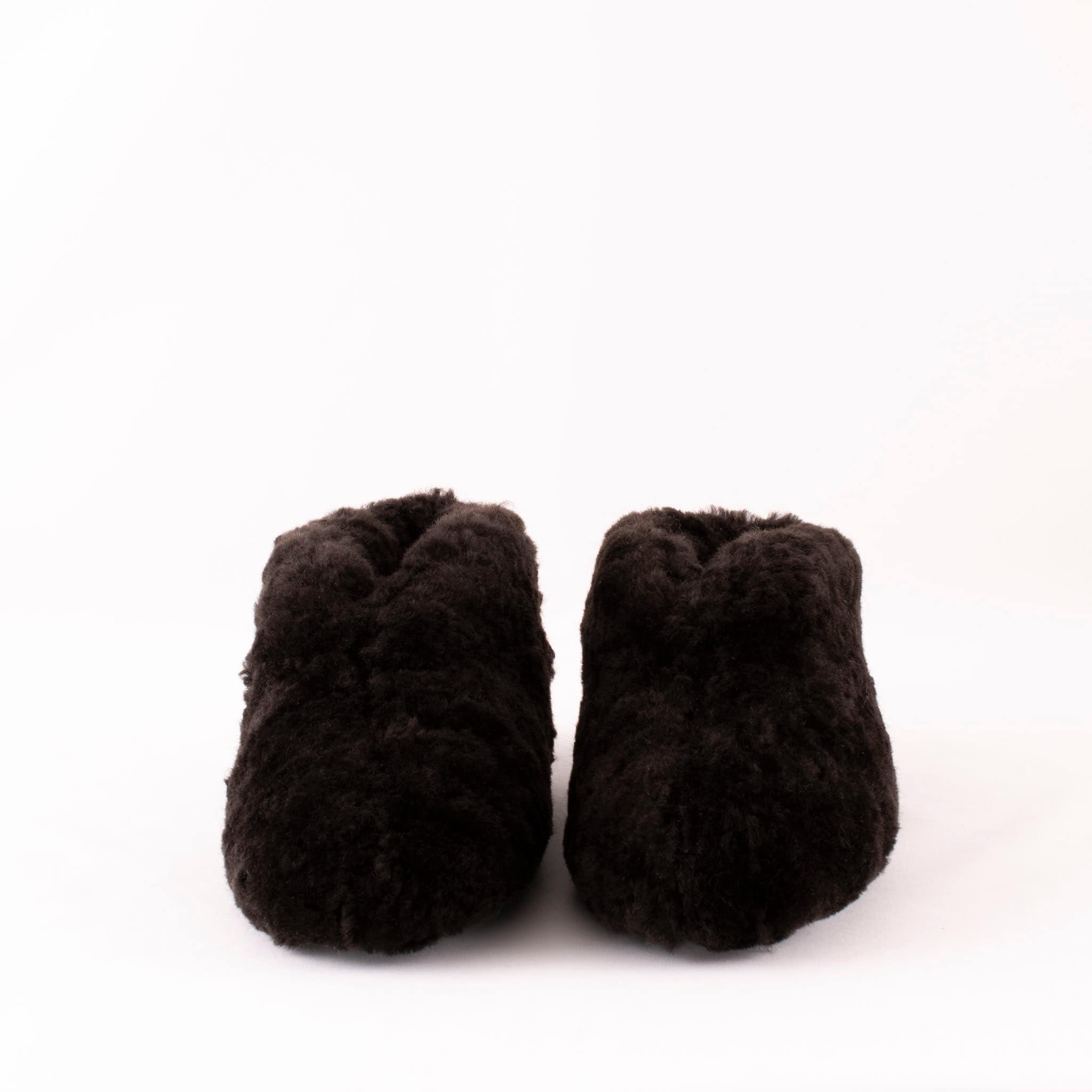 Shepherd Ulla are a pair of soft ankel high sheepskin slippers.