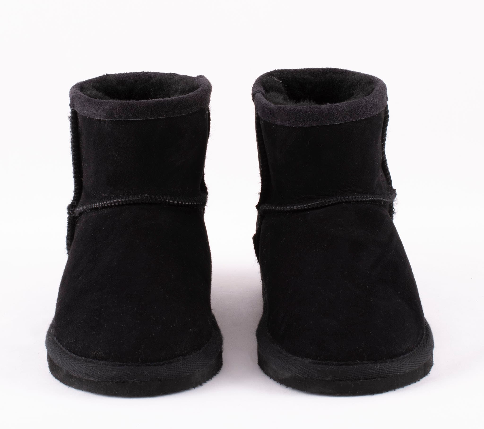 A pair of black ankel high sheepskin boots with a warm and comfortable sheepskin inside.