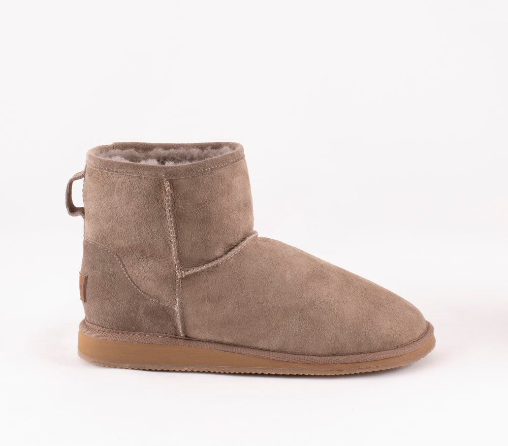A pair of grey ankel high sheepskin boots with a warm and comfortable sheepskin inside.