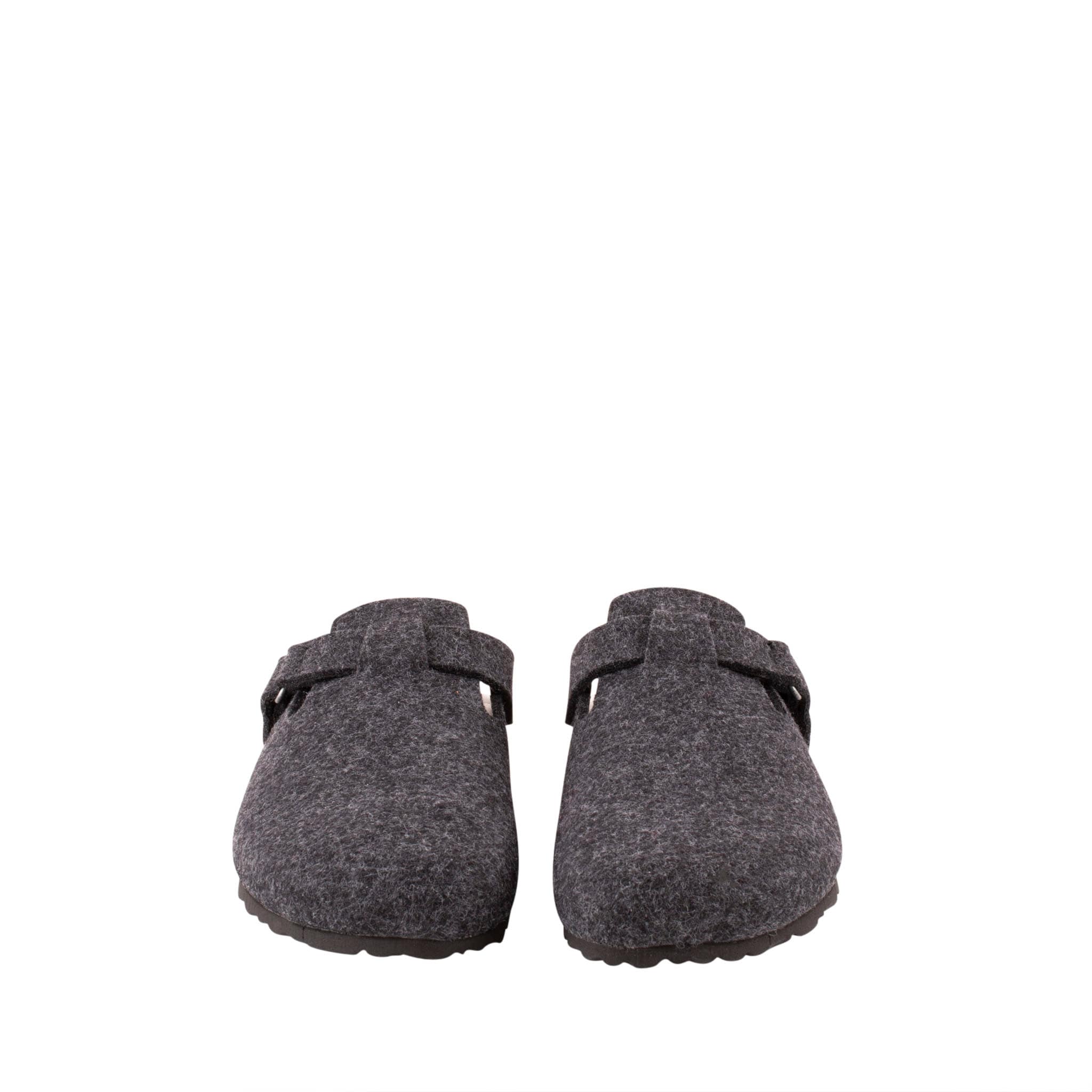 A wool slipper with an ergonomic sole