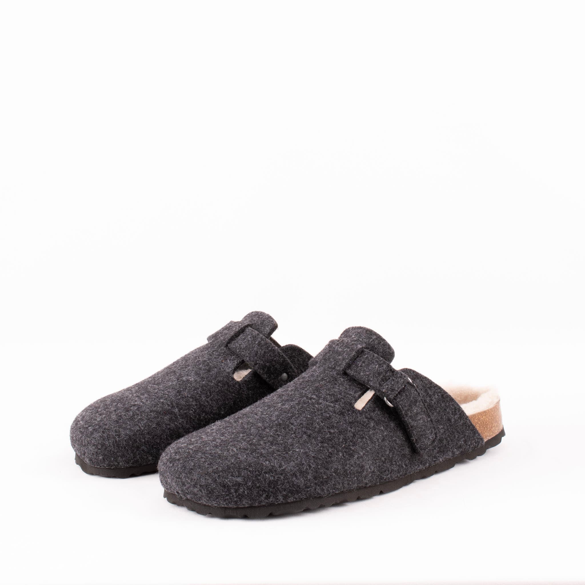 A wool slipper with an ergonomic sole