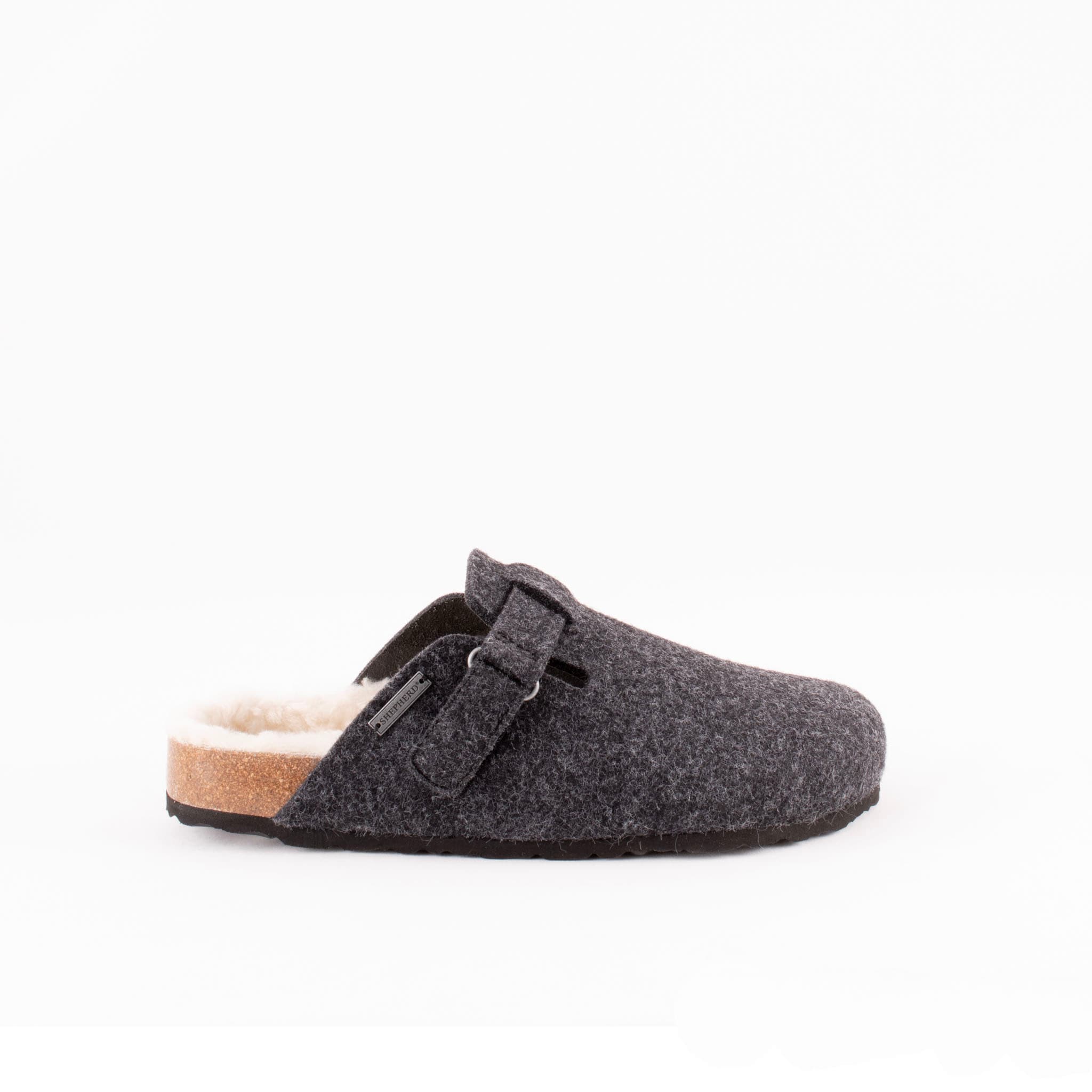 A wool slipper with an ergonomic sole